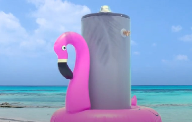 hot water heater floating in a inflatable flamingo on a beach